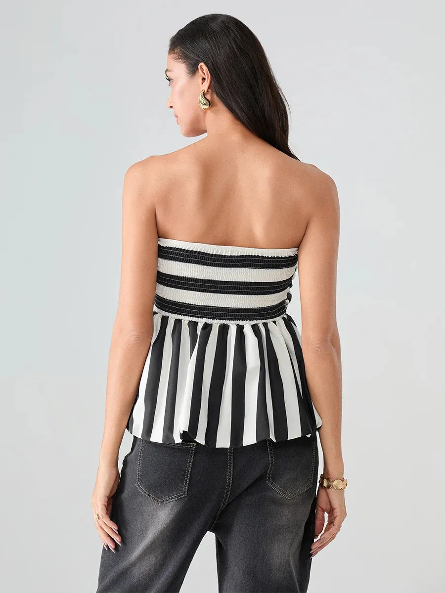 Monochrome Muse: A Strapless Beauty with Bold Stripes